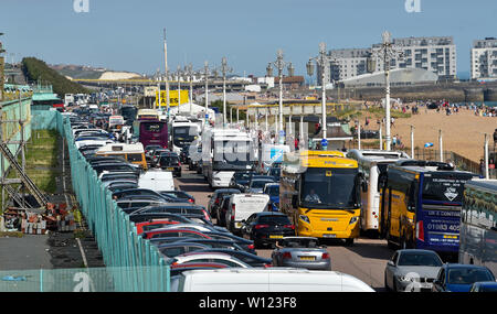 Brighton UK 29th June 2019 -  Traffic jams on Brighton seafront as crowds flock to the beach as Britain swelters in the heatwave sunshine with some areas of the south east forecast to reach over 30 degrees  . Credit : Simon Dack / Alamy Live News Stock Photo