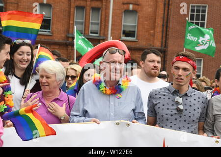 Green Party leader Eamon Ryan dancing alone the parade route at Dub li pride 2019 Stock Photo