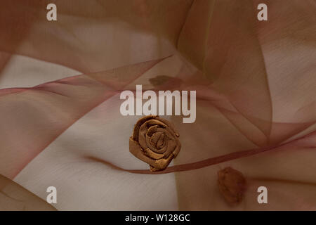 Beautiful close up of brown silk fabric with textile texture background Stock Photo
