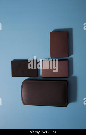 different grey and black external computer hard drives or back up storage Stock Photo