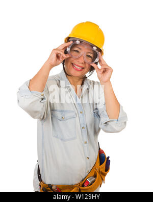 Hispanic Female Contractor Wearing Goggles, Hard Hat and Goggles Isolated on White Background. Stock Photo