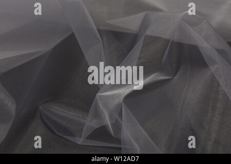 Beautiful close up of white silk fabric with textile texture background Stock Photo