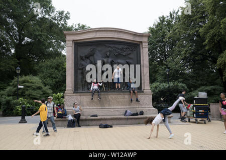 Kids love to climb on the Monument of The Marquis De Lafayette who fought with George Washington for the establishment of the USA. Entrance to Prospect Park, Brooklyn, NY. Stock Photo