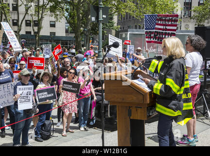 Impeach President Trump Rally at Foley Square in lower Manhattan, New York City. Congresswoman Carolyn Maloney speaks in favor of impeachment investigations going forward. Stock Photo