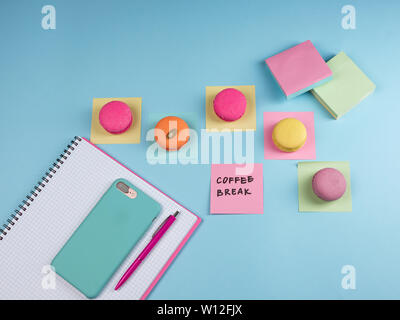 Flatlay of coffee break in girly office Stock Photo