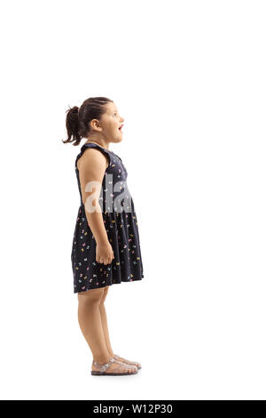 Full length profile shot of a surprised female child isolated on white background Stock Photo