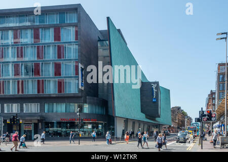 The exteriror of the Radisson Blu hotel on the corner of Argyle Street and Oswald Street in Glasgow, Scotland, featuring a pre-patinated copper screen Stock Photo