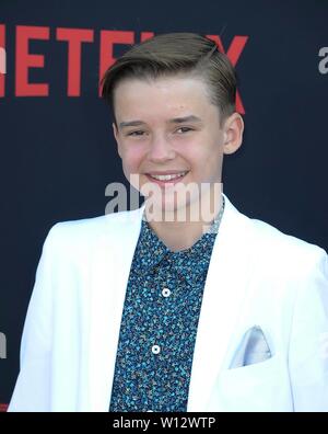 Maxwell Jenkins attends the 'Stranger Things' Season 3 World Premiere