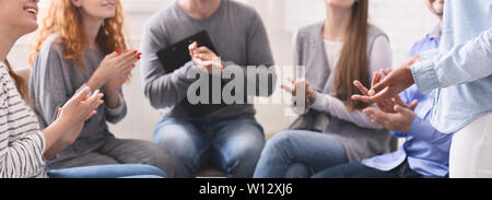 Happy patient has breakthrough in group therapy Stock Photo