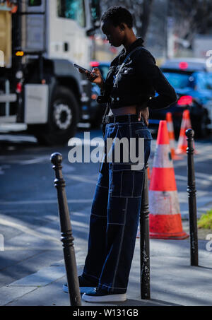 Paris, France. 28th Feb, 2019. Model on the street during the Paris Fashion Week. Credit: Mauro Del Signore/Pacific Press/Alamy Live News Stock Photo