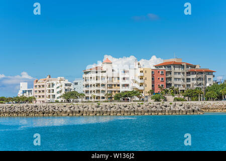 Condominium Chatanmonogatari Bayside and Harbor park in the vicinity of the American Village in Chatan City of Okinawa. Stock Photo