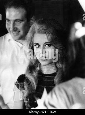 JANE FONDA as BARBARELLA on set candid filming 1968 director Roger VADIM author Jean-Claude Forest  Marianne Productions / Dino de Laurentiis Cinematografica / Paramount Pictures Stock Photo