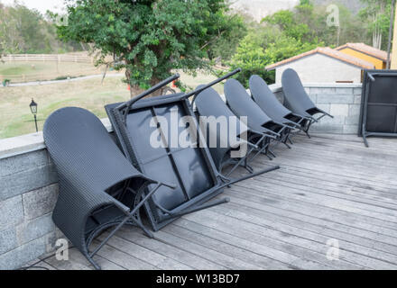 Black chair and table leaning keep neatly Stock Photo