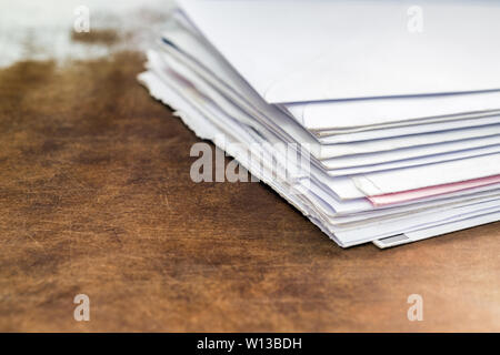 Documents and envelopes on old office table Stock Photo