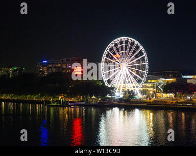 Brisbane Wheel With Its Lights On At Night Time Stock Photo