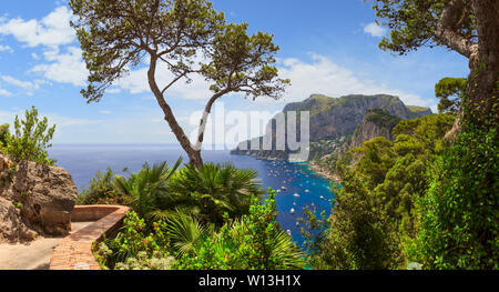 Panoramic view of Marina Piccola and Tyrrhenian sea in Capri island, Italy. Typical panoramic pedestrian path of Capri. Stock Photo