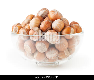 Hazelnuts in glass bowl isolated on white background with clipping path Stock Photo