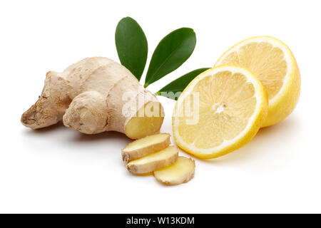 Fresh ginger and lemon with leaves isolated on white background Stock Photo