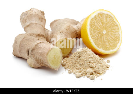 Fresh ginger root with powder and lemon isolated on white background Stock Photo