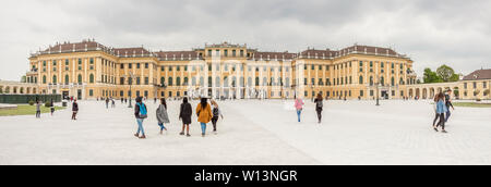 VIENNA, AUSTRIA - APRIL 23, 2019:Tourist before Schonbrunn Palace, imperial summer residence in Vienna  on April 23,2019 in Vienna,  Austria.Schonbrun Stock Photo