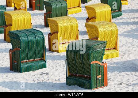 Yellow and green beach chairs at the beach of Binz, Baltic seaside resort Binz, island Rugen, Mecklenburg-Western Pomerania, Germany Stock Photo