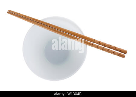 White bowl with chopsticks isolated on white background Stock Photo