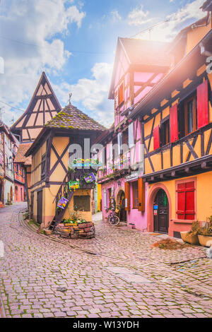The cobbled streets and half-timbered houses of the medieval village Eguisheim. Alsatian Wine Route, France Stock Photo