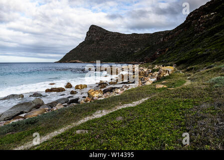 The Smitswinkel Bay shoreline on South Africa's False Bay coastline, near the city of Cape Town during winter Stock Photo