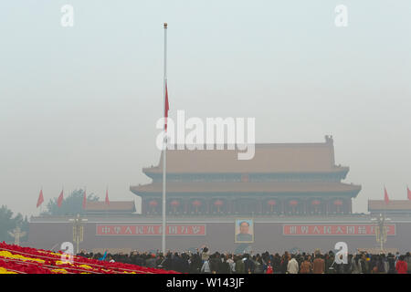 The Peoples Republic Of China Flag Being Raises At Dawn In Tiananmen Square, Beijing, Peoples Republic Of China. Stock Photo