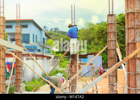 construction workers collaborating in the installation formwork workplace build a house Stock Photo