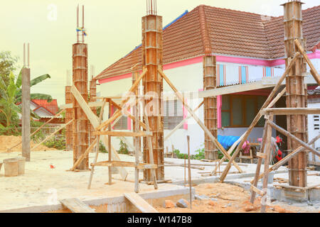construction workers collaborating in the installation formwork workplace build a house Stock Photo