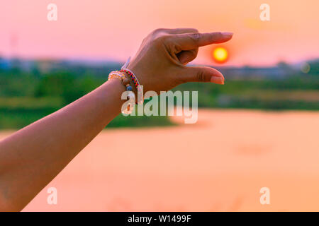 hands catch sun at sunset time concept. with copy space add text Stock Photo