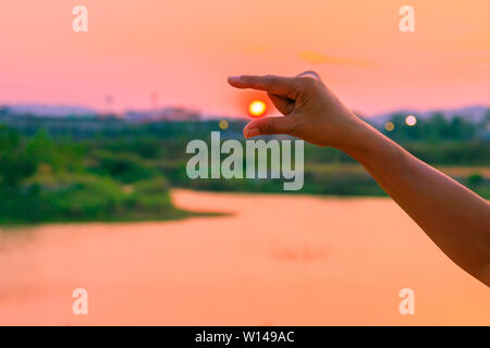 hands catch sun at sunset time concept. with copy space add text Stock Photo