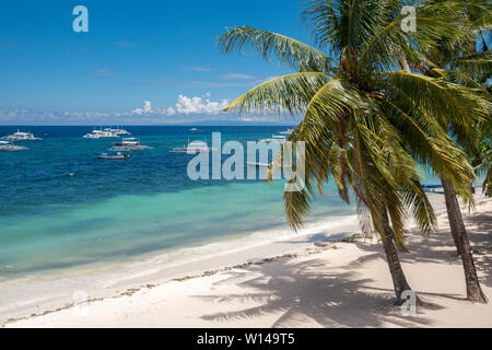 Amazing paradise Alona beach with palms in Bohol Panglao island, Philippines Stock Photo