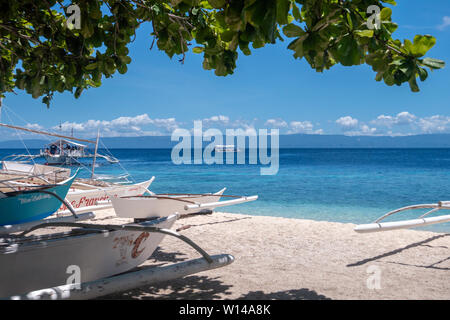 Bohol, Philippines - June, 19, 2019: Amazing paradise Alona beach with boats in Bohol Panglao island, Philippines Stock Photo