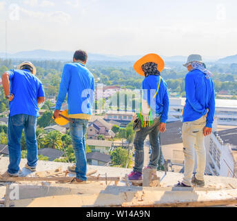 engineer curved look down construction site on housing High rise building Stock Photo