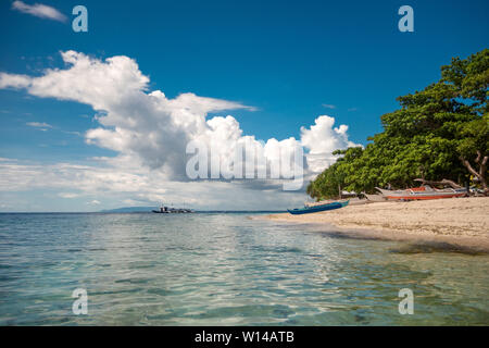 Bohol, Philippines - June, 19, 2019: Amazing paradise Alona beach with boats in Bohol Panglao island, Philippines Stock Photo