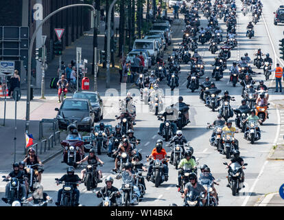 Hamburg, Germany. 30th June, 2019. Participants of the Hamburg Harley Days ride their motorcycles through the Hanseatic city in a large parade at the end of the event. Credit: Axel Heimken/dpa/Alamy Live News Stock Photo