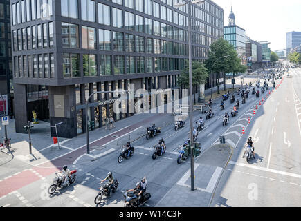 Hamburg, Germany. 30th June, 2019. Participants of the Hamburg Harley Days ride their motorcycles through the Hanseatic city in a large parade at the end of the event. Credit: Axel Heimken/dpa/Alamy Live News Stock Photo