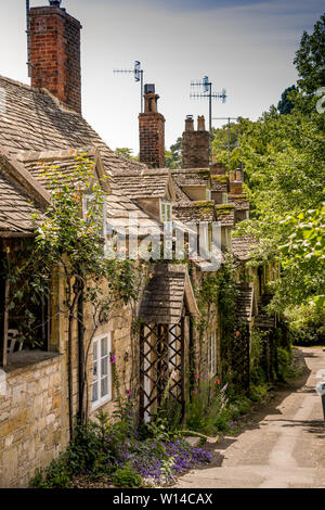 Traditional terraced cottages in the historic Cotswold town of Winchcombe, Gloucestershire UK Stock Photo