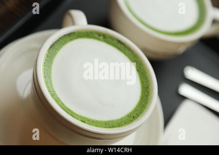 Two cups of Matcha Latte Stock Photo