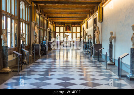 Florence, Italy - September 25, 2016: Statues in the hallway of Uffizi Gallery, one of the oldest and most famous art museums of Europe. Stock Photo