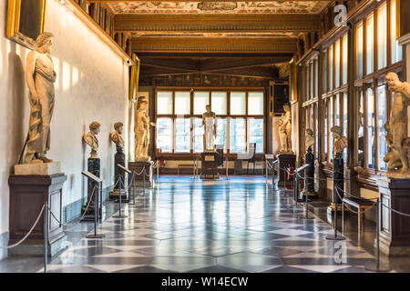 Florence, Italy - September 25, 2016: Statues in the hallway of Uffizi Gallery, one of the oldest and most famous art museums of Europe. Stock Photo