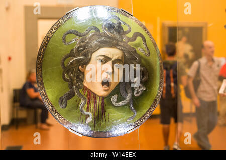 Florence, Italy - September 25, 2016: The head of Medusa by Michelangelo Merisi, known as Caravaggio, on display at the Uffizi Gallery. Stock Photo