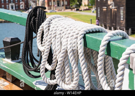 Ropes along the deck of an old historic sailing ship Stock Photo