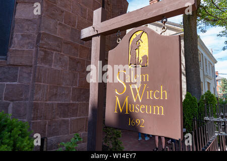 Salem, MA - June 8, 2019: Sign outside of the Salem Witch Museum which tells the story of the 1692 witch trails in Salem, Massachusetts Stock Photo