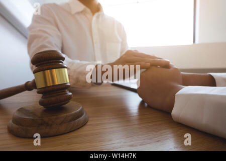 Lawyer touch and respect clients to trust partnership.Trust Promise Concept. Stock Photo