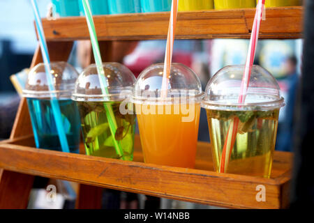 https://l450v.alamy.com/450v/w14nbb/colorful-summer-cold-drinks-in-plastic-cups-on-the-display-street-food-festival-shop-w14nbb.jpg