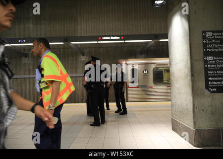 Policeman and security workers at the Union Station in Los Angeles Stock Photo