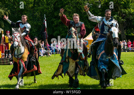 Linlithgow Palace, West Lothian, Scotland, United Kingdom, 30 June 2019. Jousting at Linlithgow Palace: Historic Environment Scotland present their annual Medieval family fun day at The Peel. The main event is a spectacular jousting and horseback riding display by the equine stunt team Les Amis D’Onno dressed in Medieval knight costumes Stock Photo